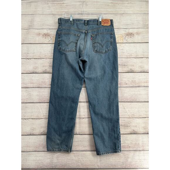 Vintage Levi's Y2K 550 Relaxed Fit Straight Jeans Men's Sz 38x32 Blue Light Wash - Picture 2 of 8